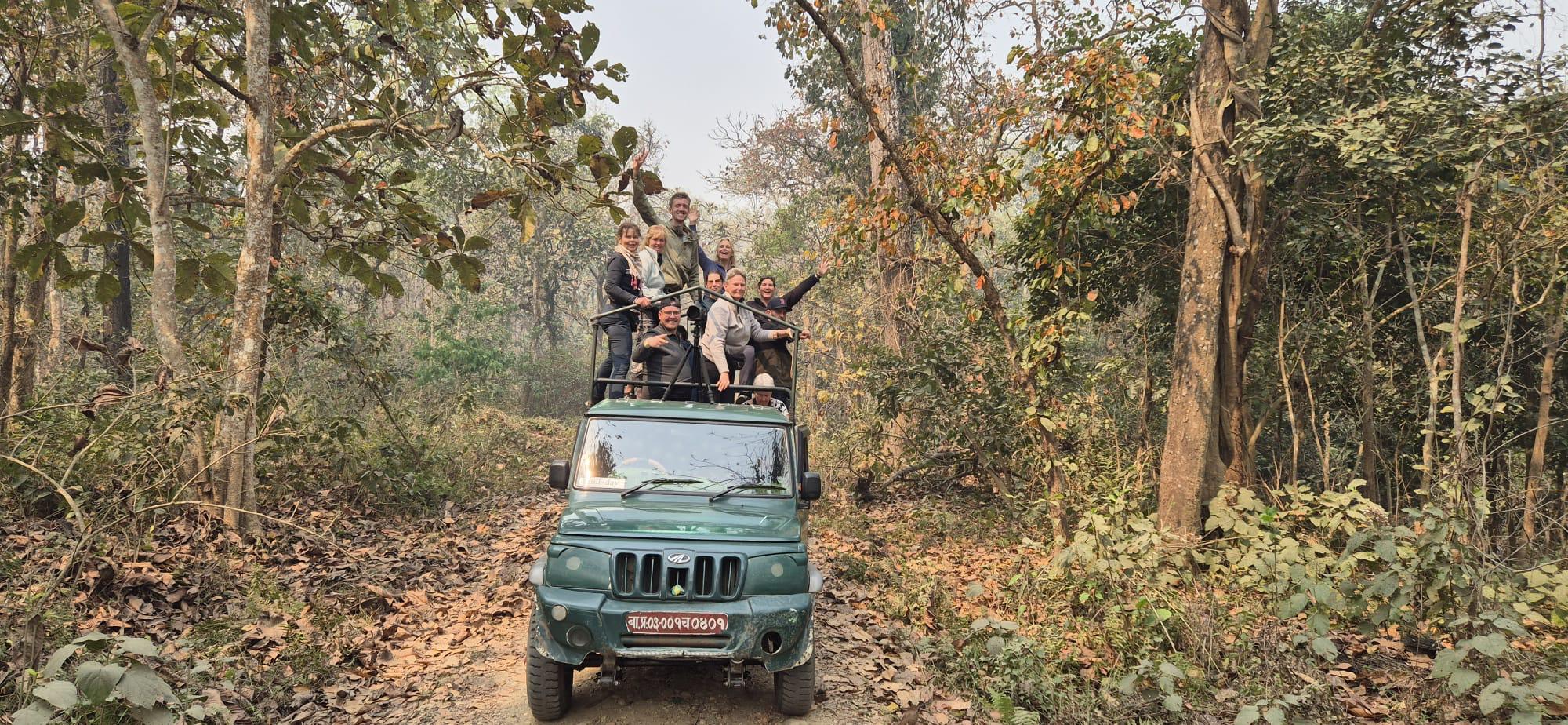 Guests enjoying a full-day jeep safari in Chitwan National Park organized by Rhino Lodge & Hotel, Sauraha